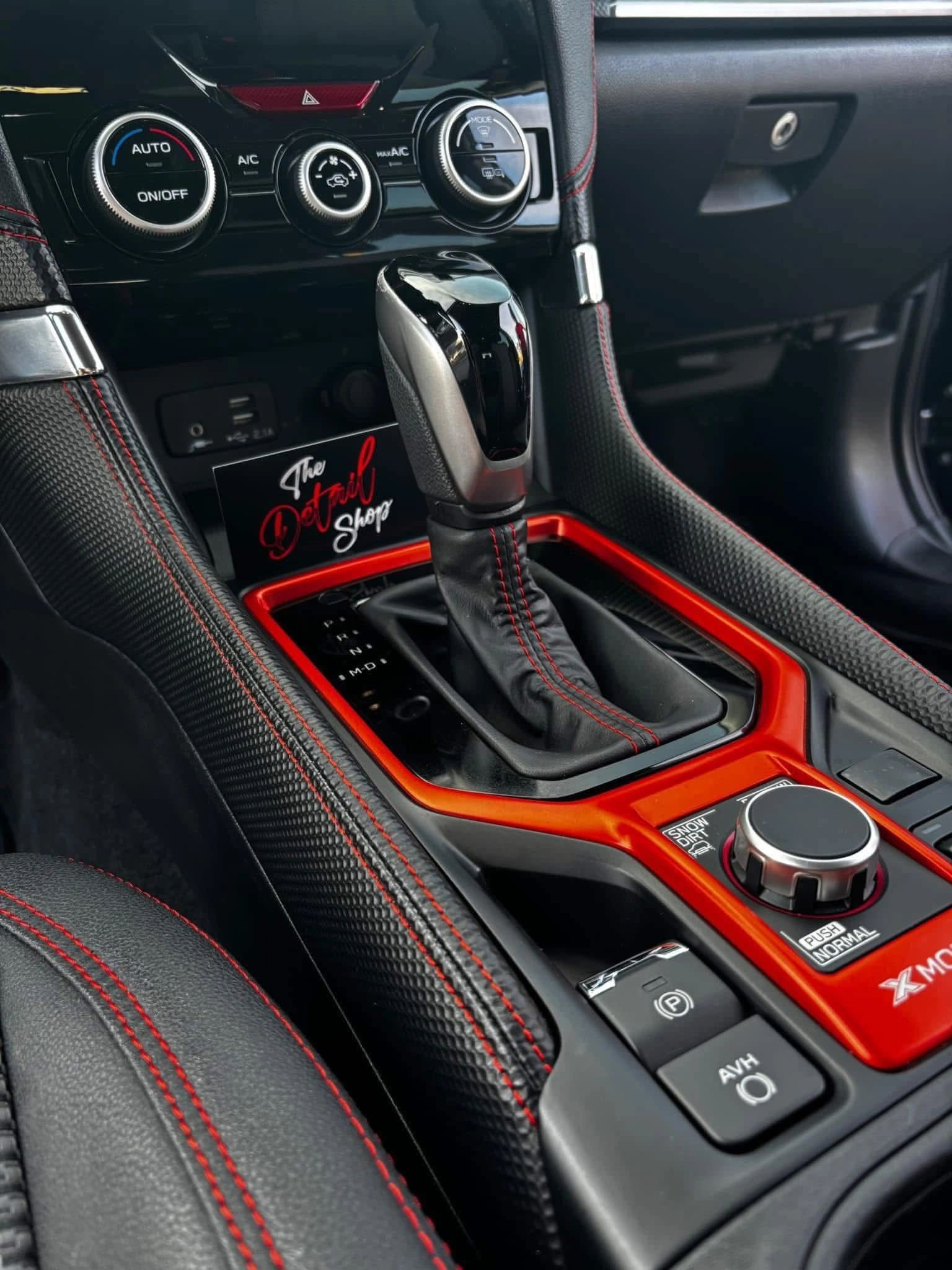 Detailed center console with Detail Shop card